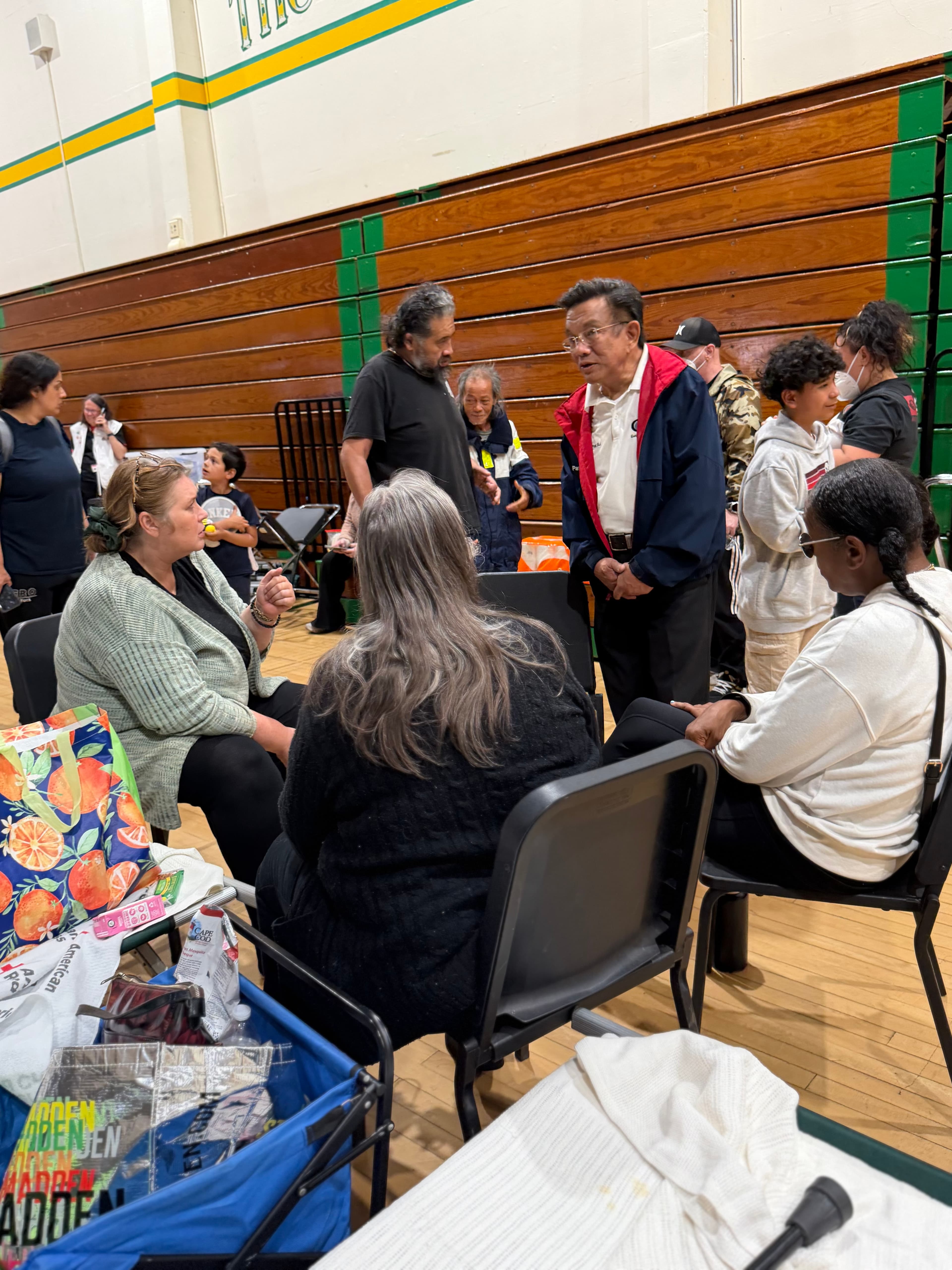 Phat Bui speaking with residents at a community meeting