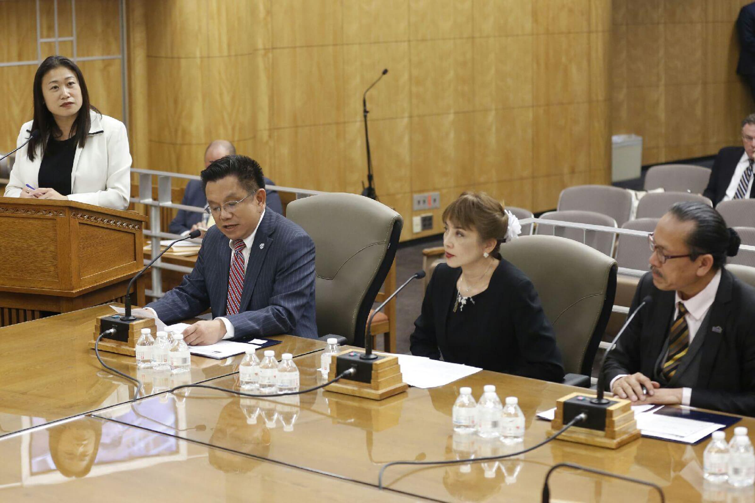 Phat Bui at a legislative committee hearing with Senator Janet Nguyen